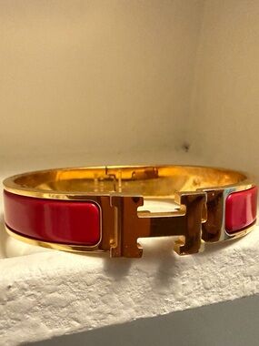 Hermès Gold Tone Cuff Bracelet with Signature H Clasp